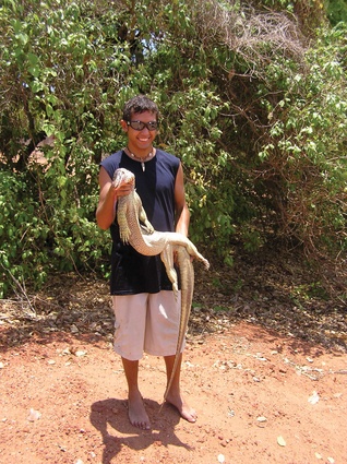 Roy Charlie holding jarlangardi he caught at the beach at Yardugarra.