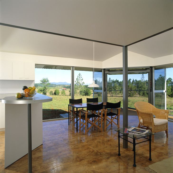 A lift-up, bi-fold glazed door is a dramatic entry to the corner deck.