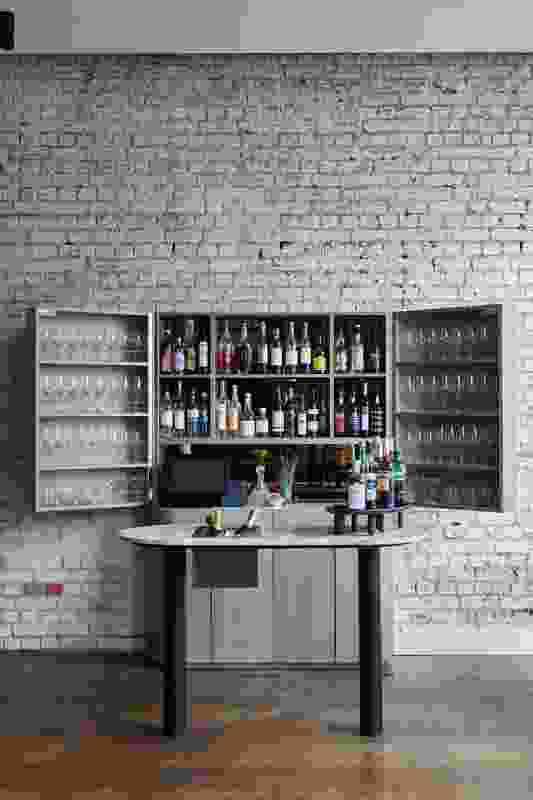 A champagne bar greets guests in the front bar.