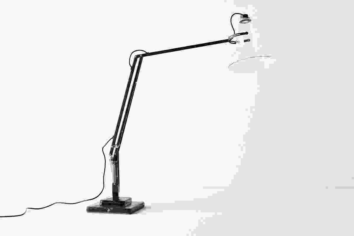 An Anglepoise lamp is remade with a clear glass shade and near-invisible LED light.