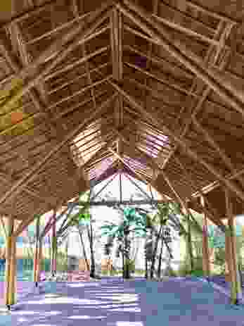 An interior view of the Amway Hlu bamboo structure and woven bamboo ceiling lining.