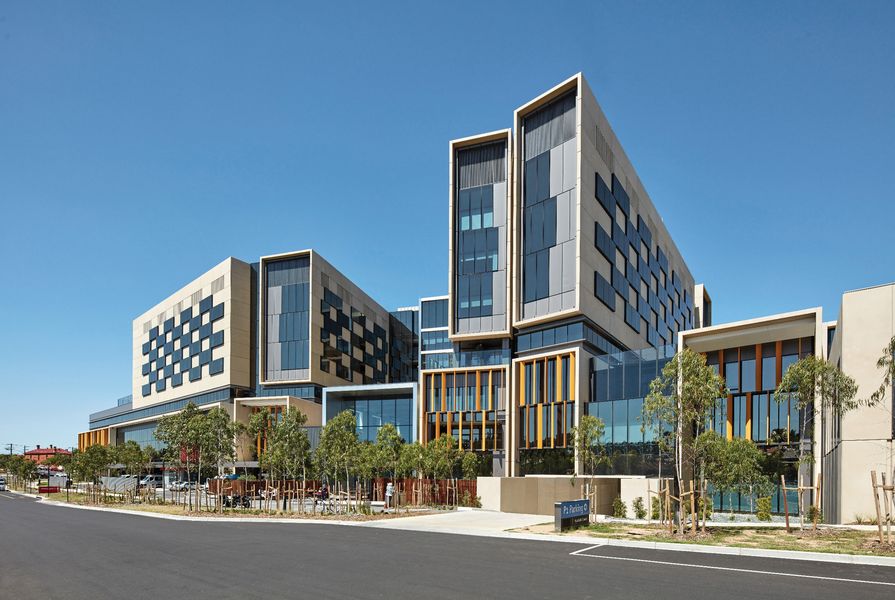 The hospital’s facade is modulated by tall, narrow forms that take cues from terrace housing.