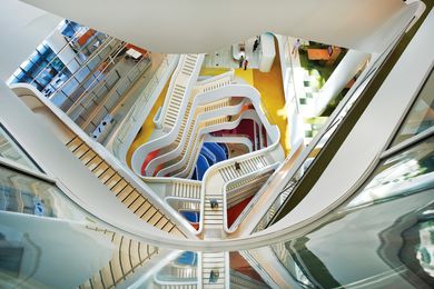 The central atrium redefines the height at which a vertical void can be used to connect a workspace while remaining humane and legible.