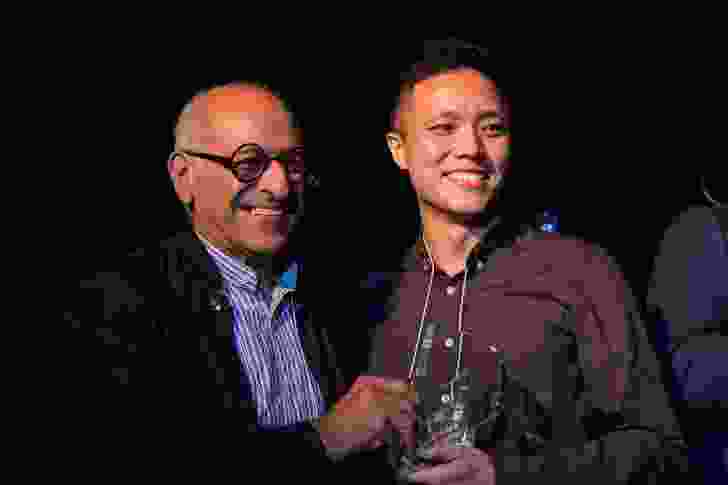 Architecture and Interior Design winner Michael Ong receiving his award from mentor Brian Zulaikha.