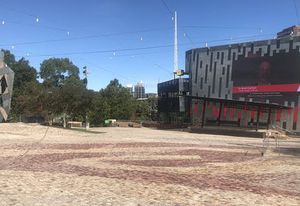 At a deserted Federation Square in Melbourne, the big screen broadcasts this message: "If you can see this, what are you doing? Go home."