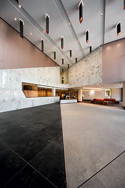  The exaggerated perspective of the Trial Courts foyer directs visitors towards key circulation points and the registry. Image John Gollings 