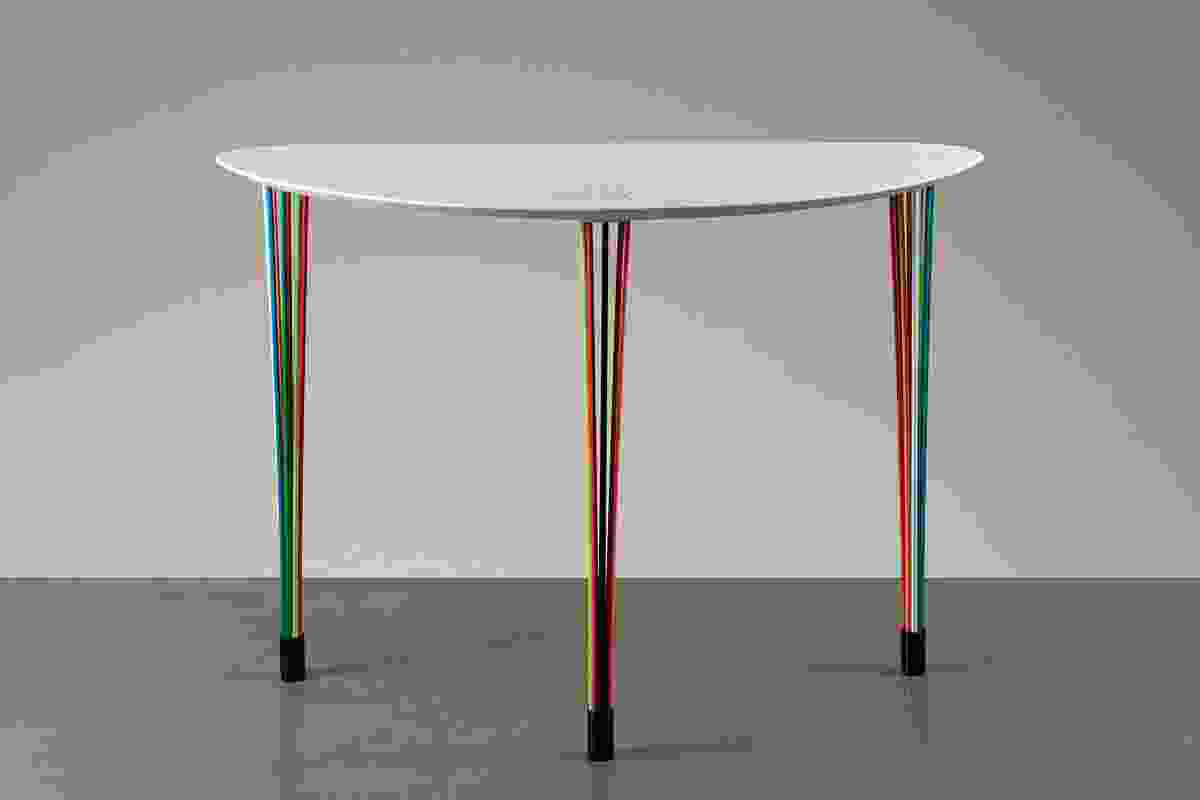 The Carousel Table is a contemporary restyling of the classic Louis XVI console.
