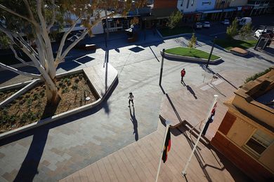 The design of Victoria Square transforms a section of a town’s main street into a pedestrian-friendly gathering place and thoroughfare.