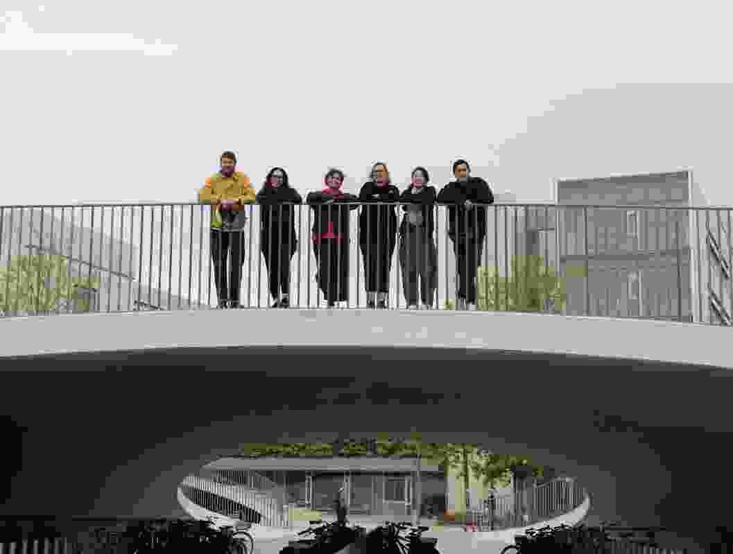 Dulux Study Tour 2025 winners Jimmy Carter, Marni Reti, Kate Shepherd, Gumji Kang and Nicholas Souksamrane with tour guide Alice at Karen Blixens Plads Public Square by Cobe.