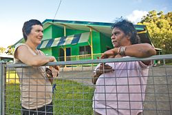 Deborah Fisher with Cheryl Graham outside her Yarrabah home.