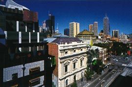 Swanston Street, with RMIT’s Building 8, by Edmond and Corrigan, and Storey Hall by Ashton Raggatt McDougall. Image: John Gollings.