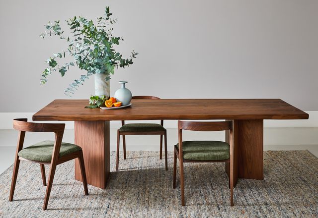 The Vero dining table by Arte Brotto celebrates the natural beauty of solid walnut.
