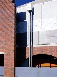 Detail of the of eastern elevation, showing the bridge to the office over the courtyard archway.
