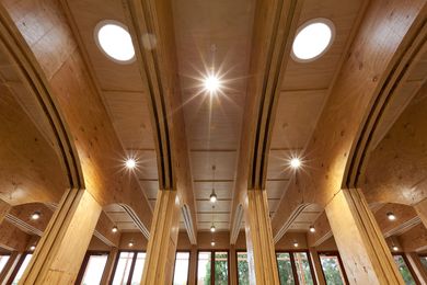 Candlebark School Library by Paul Haar: Timbers applied with elegance to support an earth covered roof.