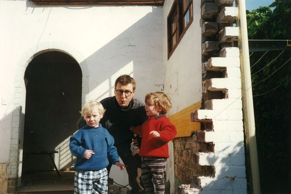 The terrible twos: Andrew Nimmo with two-year-old twins Max and Oscar in 1995, helping with demolition.