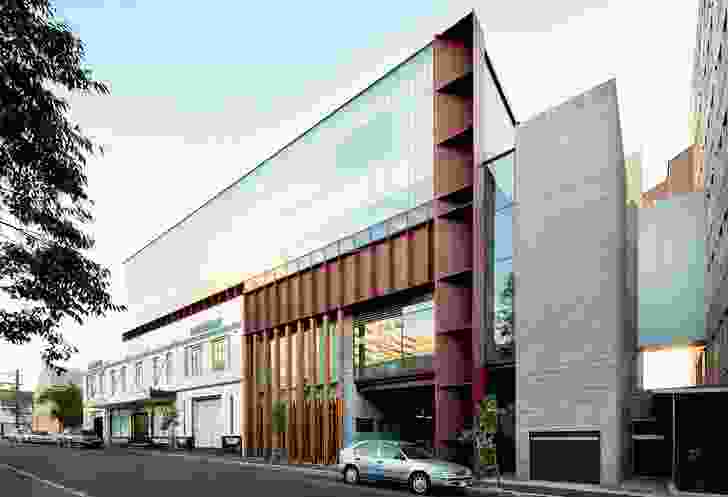 The view south along the institute’s Church Street frontage. The steel box beam at the right houses the entry and “vertical street.”