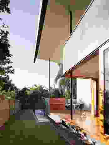 The rear extension is a series of generous platforms that hover just above ground level.