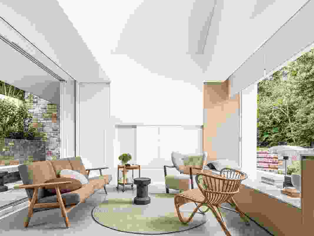 Compact living spaces feel expansive thanks to the private courtyard, shared garden and pop-up roofline.