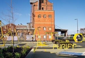 Tubular steel spells out climbable words linked to flour milling: wheat, flour, blend and purify.