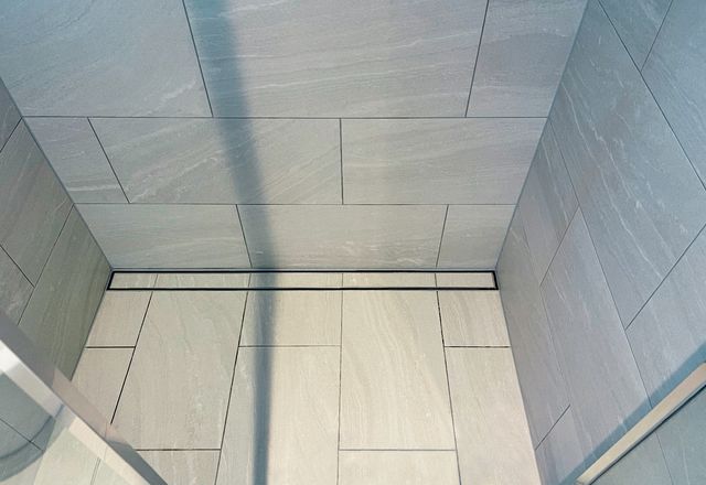 Wall-to-wall shower channels specified for Victoria & Vine