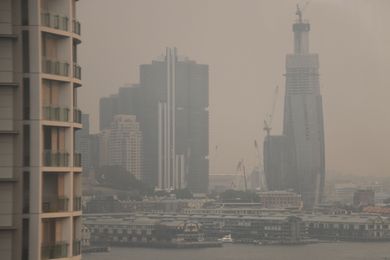 Smoke haze from bushfires in Blue Mountains, seen from Sydney Harbour Bridge  by Sardaka, licensed under  CC BY-SA 4.0  