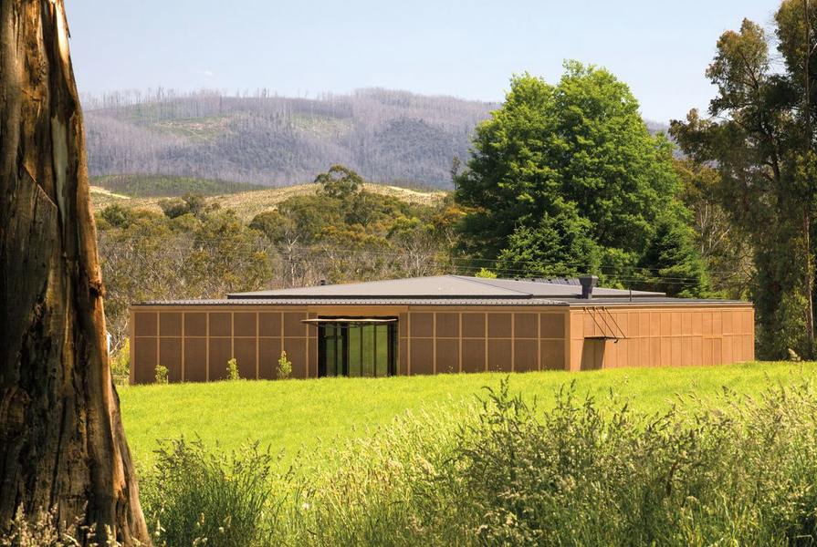 The Narbethong Community Hall, by BVN and Arup and a number of consultants working pro bono, replaced a centre that was destroyed in the Black Saturday fires in 2009. The hall is wrapped in a bronze mesh fire-resistant screen