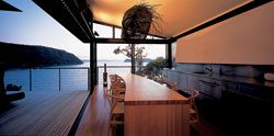 Harbour
view, seen across the kitchen/dining room, with table
by Caroline Casey.Photograph Anthony Browell