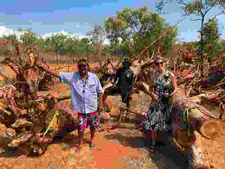 Arnold Smith, Jimmy Edgar and Vanessa Margetts selecting wood for the youth carving project at Town Beach, Broome.