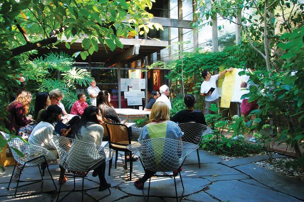 Courtyard crit at the 2013 Summer School at Robin Boyd's Walsh Street house. 