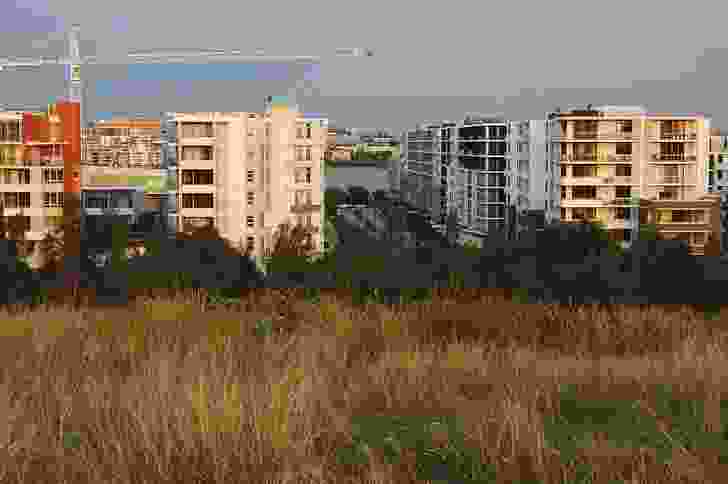 View of the block housing from one of the artificial hills.