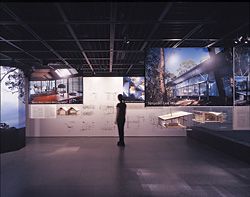 An overview of the lower level of the exhibition space, which portrays the Boyd Art Centre and four houses by Glenn Murcutt. The upper level presents original drawings in the manner of a study.