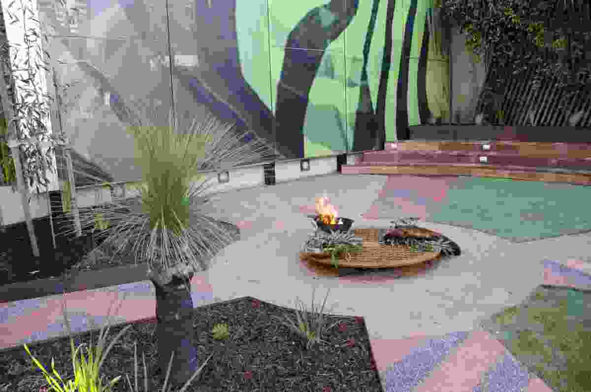 A sculptural laser-cut smoke pit at Ngarara Place at RMIT City Campus by Greenaway Architects.