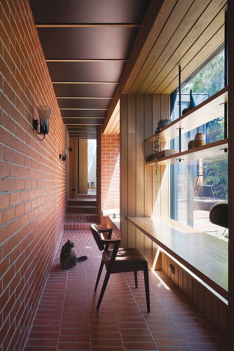 At Carlton Cloister (2015), a corridor between the main house and the rear addition expands to make space for a desk and storage.