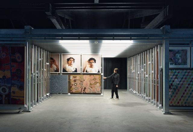 The archives are positioned so that visitors can engage directly with the racking system. Artwork (clockwise from left): Tuppy Goodwin, Christian Thompson, Charlie Tararu Tjungurrayi and Lisa Wolfgramm.