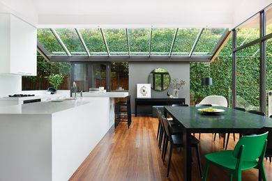 A glazed pavilion attaches to the rear of the original dwelling.