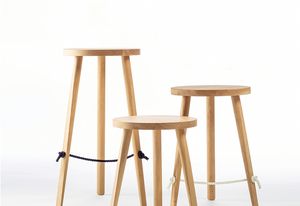 The double-braided polyester footrest of the Mariner stools hints at a nautical inspiration.