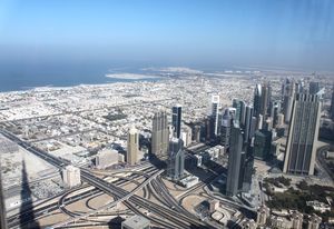 Old Dubai (low-density and fine urban grain) in the background with New Dubai in the foreground.