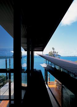 Looking out to the harbour, along the living pavilion,
with the kitchen/dining room below on the right.Photograph Anthony Browell