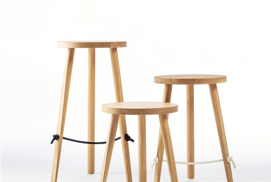 The double-braided polyester footrest of the Mariner stools hints at a nautical inspiration.
