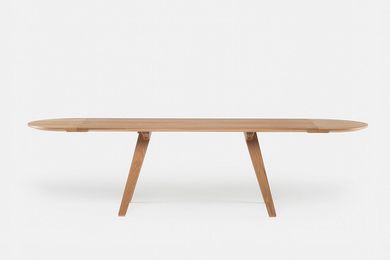 The design of the Together dining table for De La Espada was limited to the maximum dimensions considered conducive to comfortable conversation.