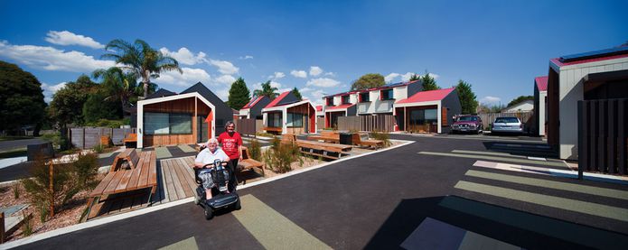 Shared pedestrian and vehicular space blurs ownership boundaries.