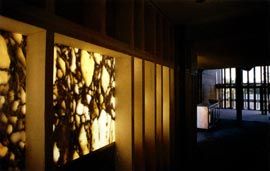 Afternoon light through the Carrara cladding at the office bridge.