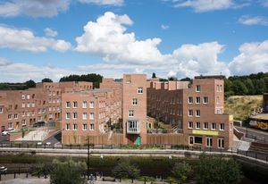 The Malings, Newcastle upon Tyne by Ash Sakula Architects, completed in 2016. In her keynote presentation, Cany Ash of Ash Sakula Architects explained that for this site the developer initially considered typical apartment buildings, but instead her team teased out a village of stepped houses.