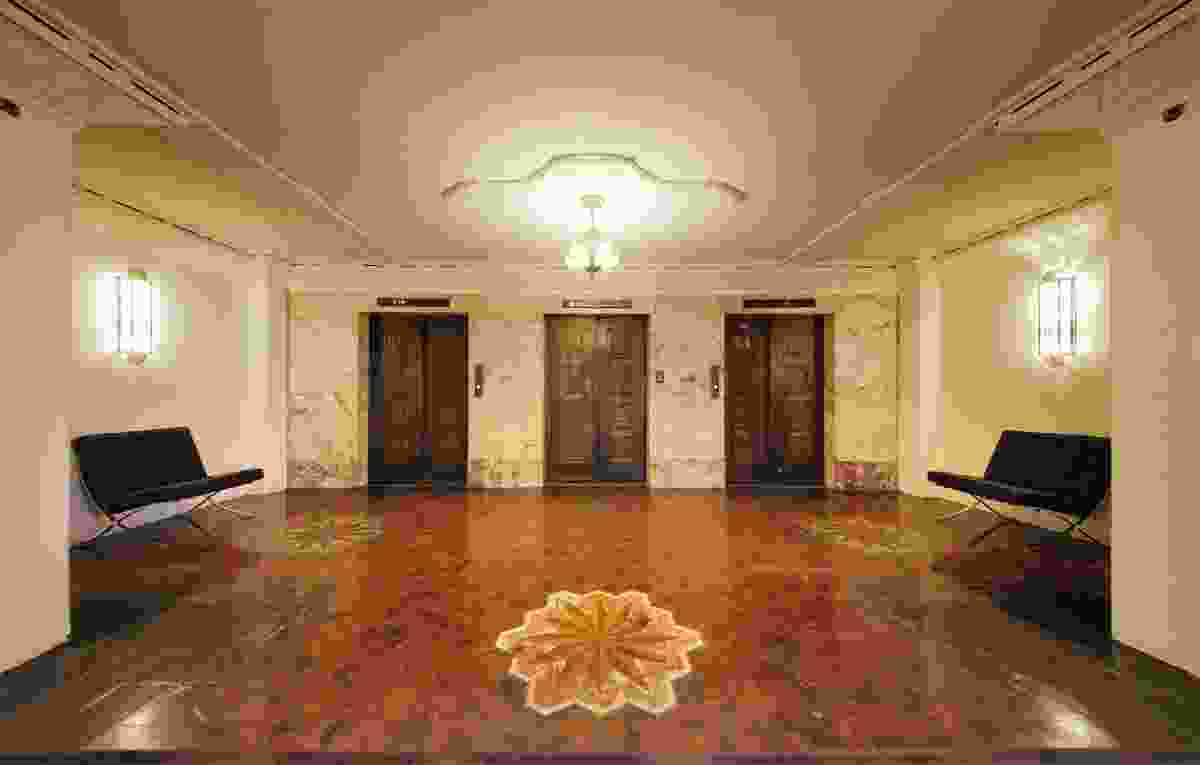 The level-11 lobby with original marble inlay flooring.