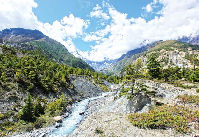 The Marsyangdi River between the village of Pisang and the town Manang, with the mountain peak Annapurna III in the background.