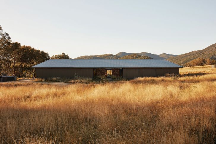 One connected form unites the house with its sheds, in the process enclosing a sheltered courtyard. Pictured: House in the Dry.