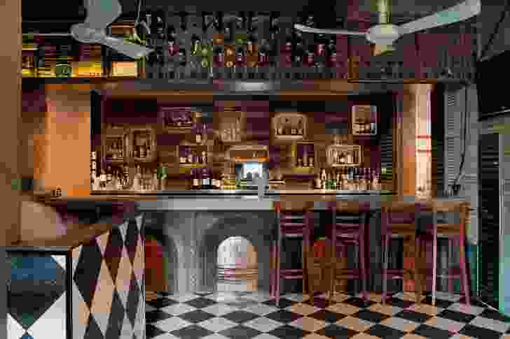 The bar front is made of old fireplaces.