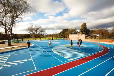 The graphic surface of the multipurpose area allows for a variety of sports and activities to occur simultaneously.