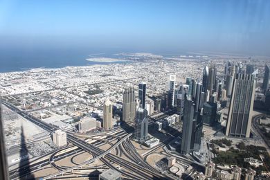 Old Dubai (low-density and fine urban grain) in the background with New Dubai in the foreground.