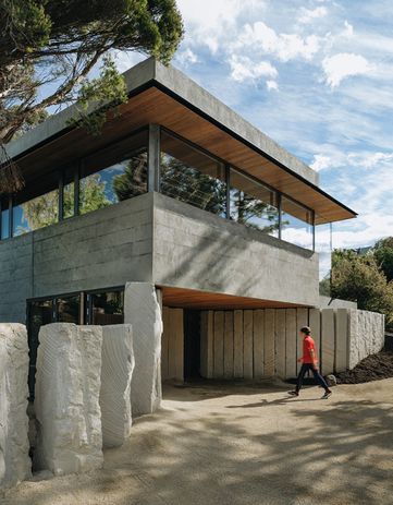 The entry to Cascade House is lined with pillars formed from local sandstone.